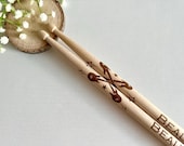 Custom logo drumsticks set with personalized engraving, perfect for drummers and musicians. A unique gift for groomsmen, dads, boyfriends, husbands, or band members. Ideal for birthdays, anniversaries, or retirement, these high-quality wooden drumsti thumbnail 1