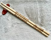 Custom engraved maple wood drumsticks, perfect for drummers and musicians. Personalize with any name or text in various fonts and typography. A unique gift for groomsmen, dads, boyfriends, husbands, or band members. Crafted from durable maple wood fo thumbnail 3